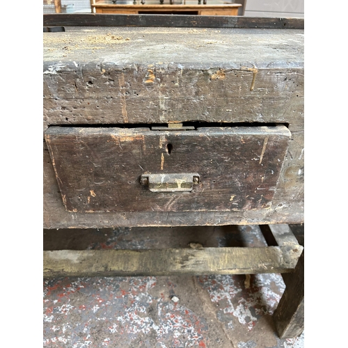 84 - An early 20th century pine workbench with single drawer and Parkinson's Patent Perfect vice - approx... 