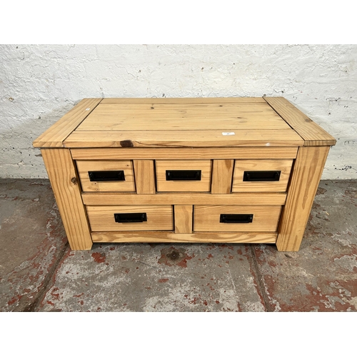 94 - A Mexican pine rectangular coffee table with five drawers - approx. 47cm high x 50cm wide x 90cm lon... 