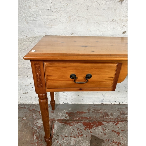 95 - A Jaycee pine dressing table with two drawers and turned supports - approx. 75cm high x 123cm wide x... 
