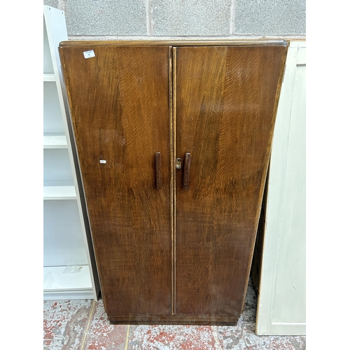 23 - An Art Deco style oak double wardrobe with fitted interior - approx. 160cm high x 85cm wide x 47cm d... 