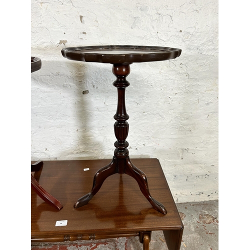 96 - Three pieces of mahogany furniture, two tripod pedestal wine tables and one rectangular drop leaf ly... 