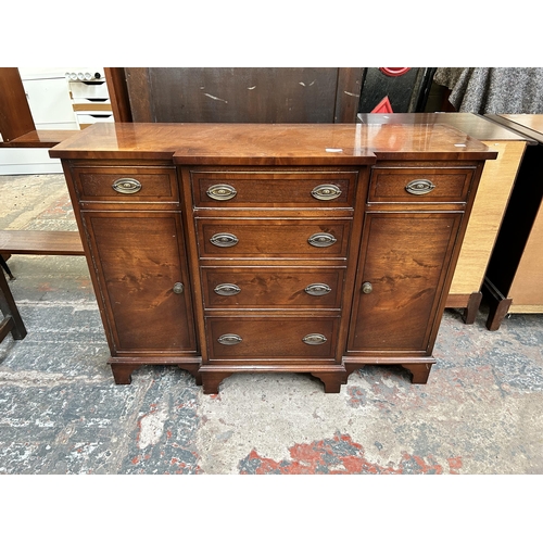 33 - A Bevan Funnell Reprodux mahogany sideboard with two short drawers, four long drawers and two cupboa... 