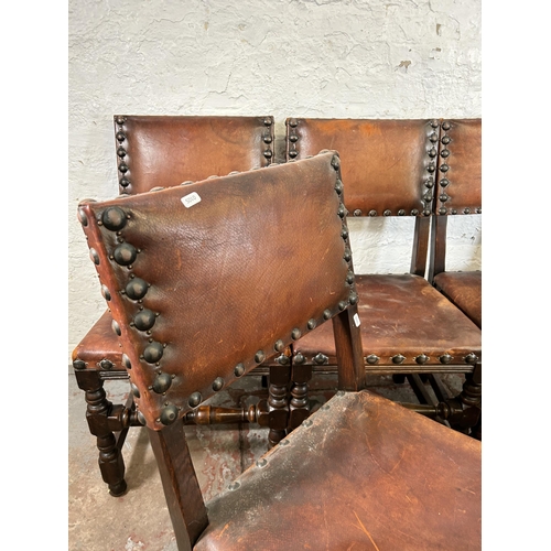 34 - A set of six Cromwellian style oak and brown leather dining chairs