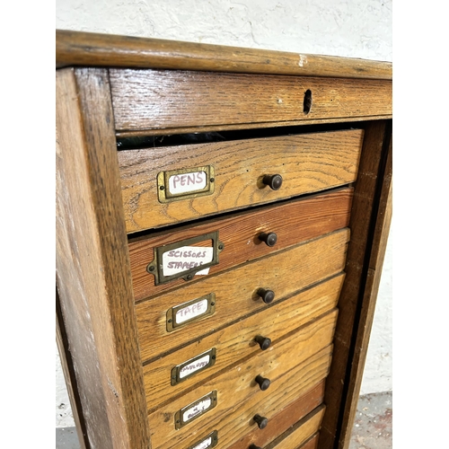 36 - An early/mid 20th century oak ten drawer filing cabinet - approx. 107cm high x 48cm wide x 39cm deep