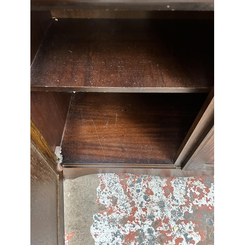 37 - An oak sideboard with two drawers and two cupboard doors - approx. 82cm high x 92cm wide x 40cm deep