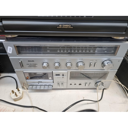 518 - Two items of hi-fi one Technics SL-PD687 five-disc changer CD player and one Philips F1218/35 music ... 