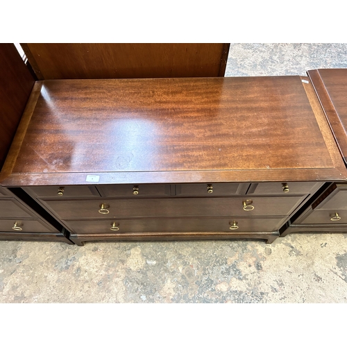 4 - A Stag Minstrel mahogany chest of four short over two long drawers - approx. 72cm high x 106cm wide ... 