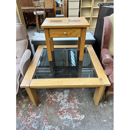44 - Two pieces of modern oak furniture, one side table and one coffee table with smoked glass insert - a... 