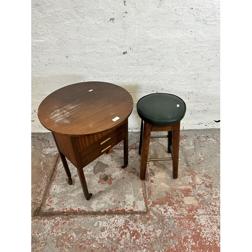 46 - Two pieces of furniture, one mid 20th century mahogany sewing table with two drawers and fitted inte... 