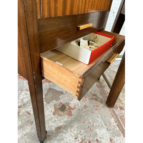 46 - Two pieces of furniture, one mid 20th century mahogany sewing table with two drawers and fitted inte... 