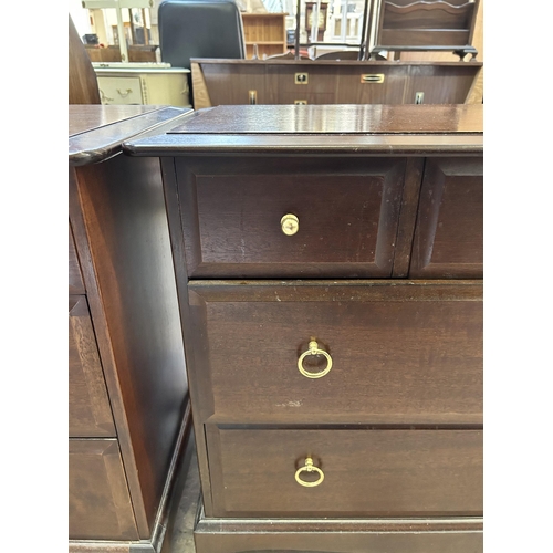 5 - A Stag Minstrel mahogany chest of three short over two long drawers - approx. 72cm high x 82cm wide ... 