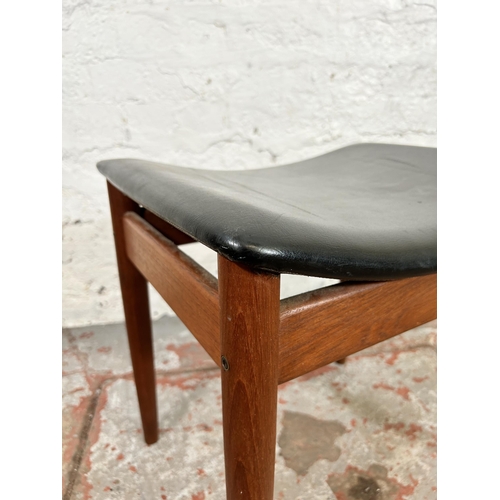 117 - A 1960s Danish Finn Juhl teak and black vinyl dressing table stool - approx. 46cm high x 48cm wide x... 