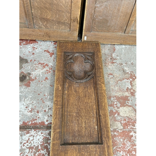 125 - Seven 1930s ecclesiastical carved oak panels