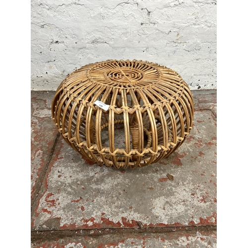 132 - A 1970s wicker and bamboo lobster pot footstool