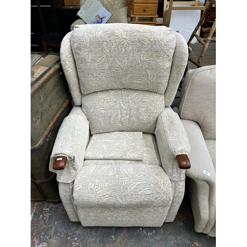 137C - A modern fabric upholstered electric reclining armchair with power supply and remote