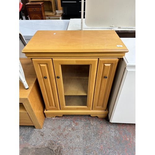 141 - A Sherry Furniture beech stereo cabinet with two outer CD racks