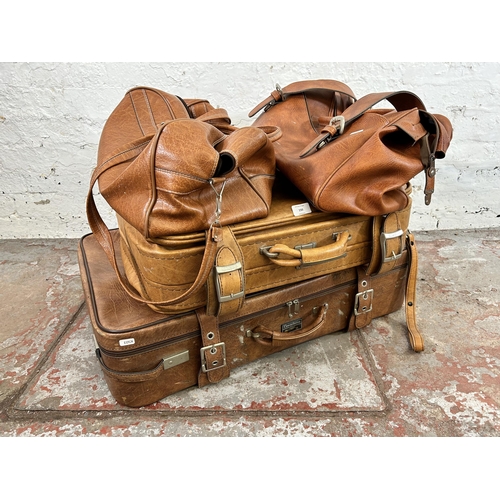 150 - Four pieces of vintage brown luggage, two suitcases and two travel bags