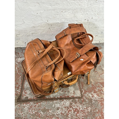 150 - Four pieces of vintage brown luggage, two suitcases and two travel bags