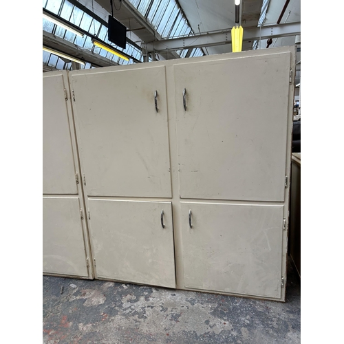 152 - Two mid 20th century white painted four door kitchen cabinets - approx. 120cm high x 106cm wide x 31... 