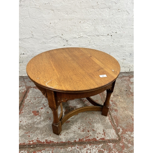 155 - An Old Charm oak circular side table - approx. 40cm high x 60cm diameter