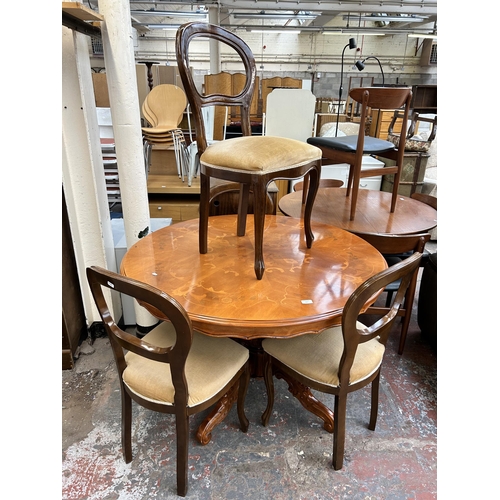 157 - A Sorrento style inlaid walnut effect circular pedestal dining table and four Victorian style beech ... 