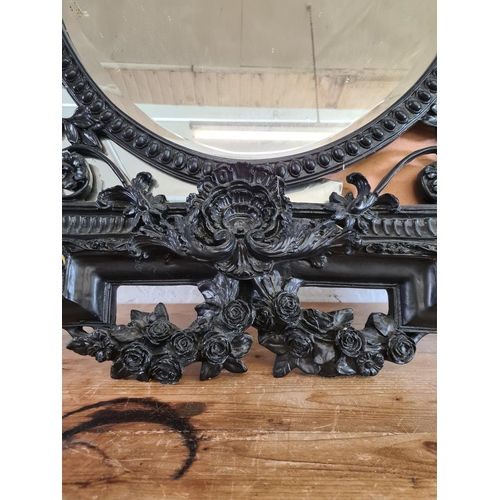 170 - A Victorian style black framed bevelled wall mirror - approx. 140cm high x 101cm wide