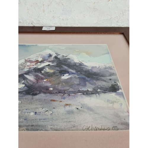 172 - A framed watercolour of a mountain scene signed lower right - approx. 40cm high x 75cm wide