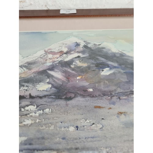 172 - A framed watercolour of a mountain scene signed lower right - approx. 40cm high x 75cm wide