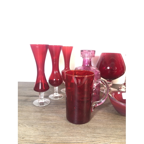 267 - Fourteen pieces of mid 20th century red glassware