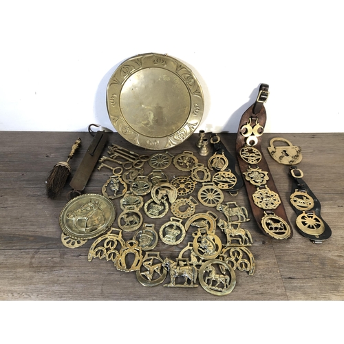 295 - A collection of brassware to include Joseph Sankey & Sons charger, horse brasses etc.