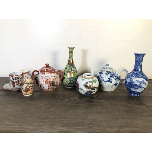 278 - Eight pieces of Oriental ceramics to include Chinese blue and white teapot, Japanese Satsuma bud vas... 