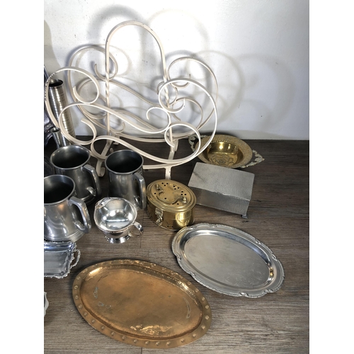 308 - A collection of metalware to include My Lady English hand hammered pewter lidded box, Viners of Shef... 