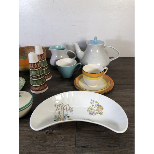 282 - A collection of mid 20th century ceramics to include Myott Son & Co hand painted circular bowl, Pool... 