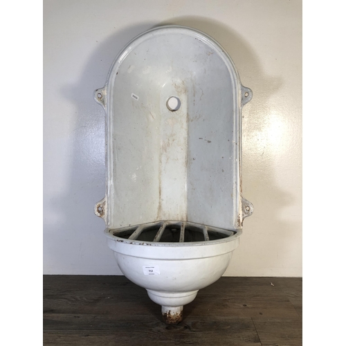 312 - A French white painted cast iron wall fountain - approx. 75cm high