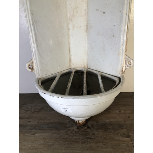 312 - A French white painted cast iron wall fountain - approx. 75cm high