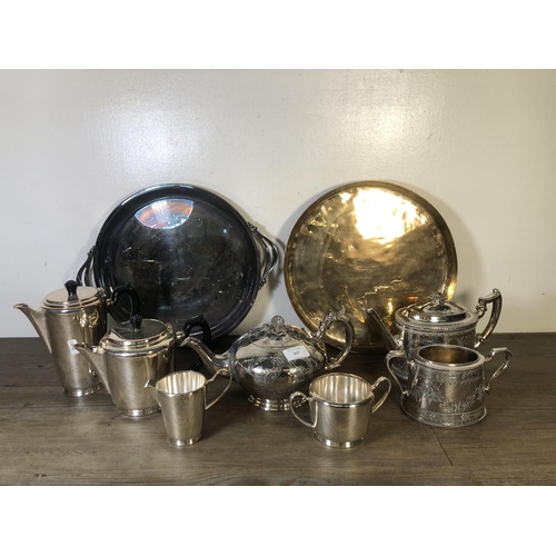 317 - A collection of metalware to include Shaw & Fisher Sheffield silver plated teapot, brass circular tr... 