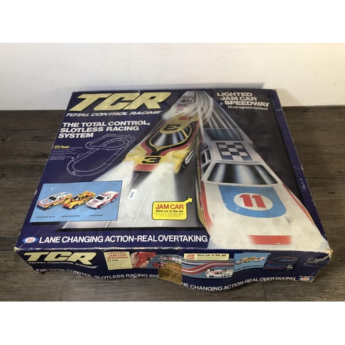 324 - Two vintage TCR slot car sets, one Zigzag Jam Raceway and one Lighted Jam Car Speedway