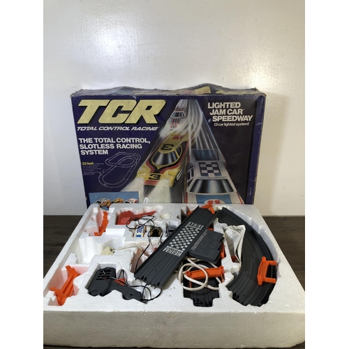 324 - Two vintage TCR slot car sets, one Zigzag Jam Raceway and one Lighted Jam Car Speedway