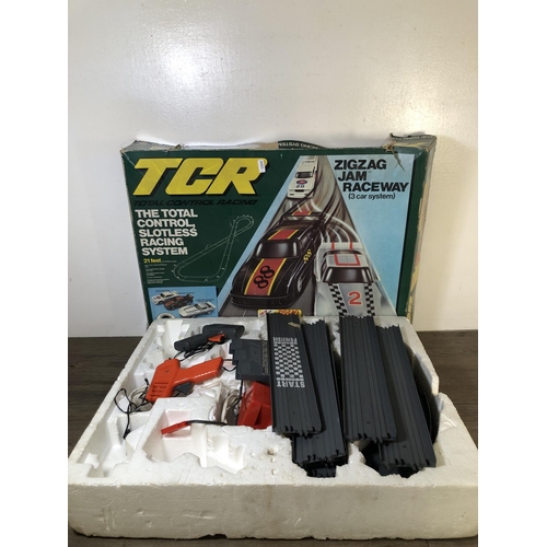 324 - Two vintage TCR slot car sets, one Zigzag Jam Raceway and one Lighted Jam Car Speedway