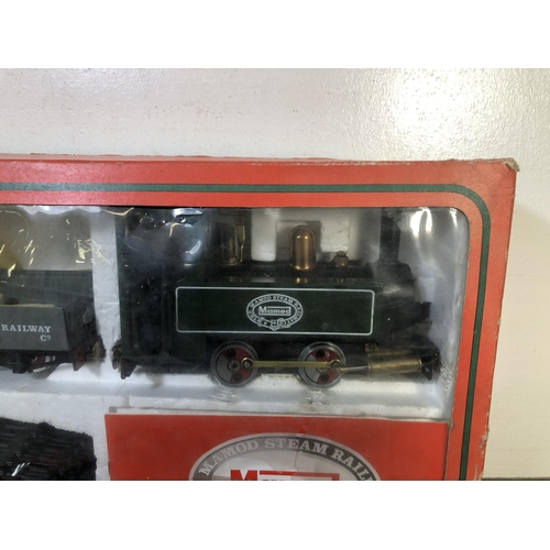 325 - A vintage boxed Mamod Steam Railway with locomotive, tender and track