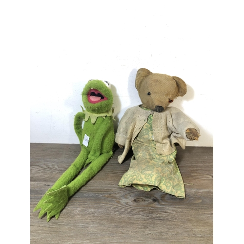 335 - Two mid 20th century soft toys, one straw filled articulated teddy bear - approx. 38cm high and one ... 