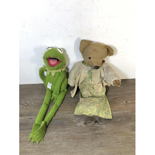 335 - Two mid 20th century soft toys, one straw filled articulated teddy bear - approx. 38cm high and one ... 