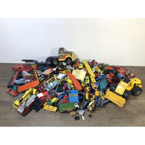 338 - A large collection of vintage diecast model vehicles to include Bburago Ferrari GTO, Tonka dump truc... 