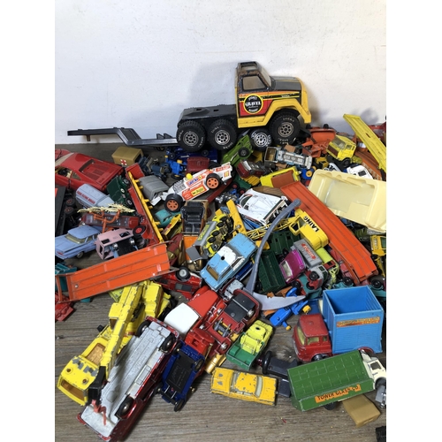 338 - A large collection of vintage diecast model vehicles to include Bburago Ferrari GTO, Tonka dump truc... 