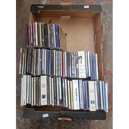 579 - Three boxes containing a collection of CDs to include Nirvana, The Verve, The Stone Roses, The Prodi... 