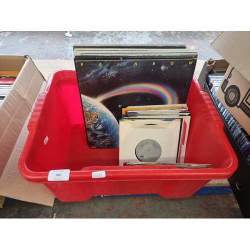 580 - A box containing a collection of LP and 7