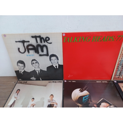 613 - Fourteen LP vinyl records to include The Jam 'In the City' and 'All Mod Cons', Talking Heads '77' an... 