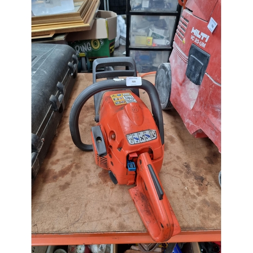 709 - A Husqvarna 236 petrol power chain saw