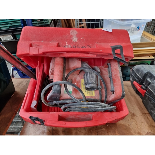 711 - A cased Hilti DC-SE20 110v wall chaser with instruction manual