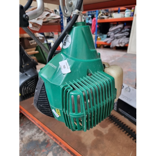 722 - A Gardenline petrol strimmer